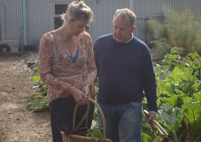 Patrick explaining the virtues of Rhubarb to Nicky. Just picked and still in his hand.